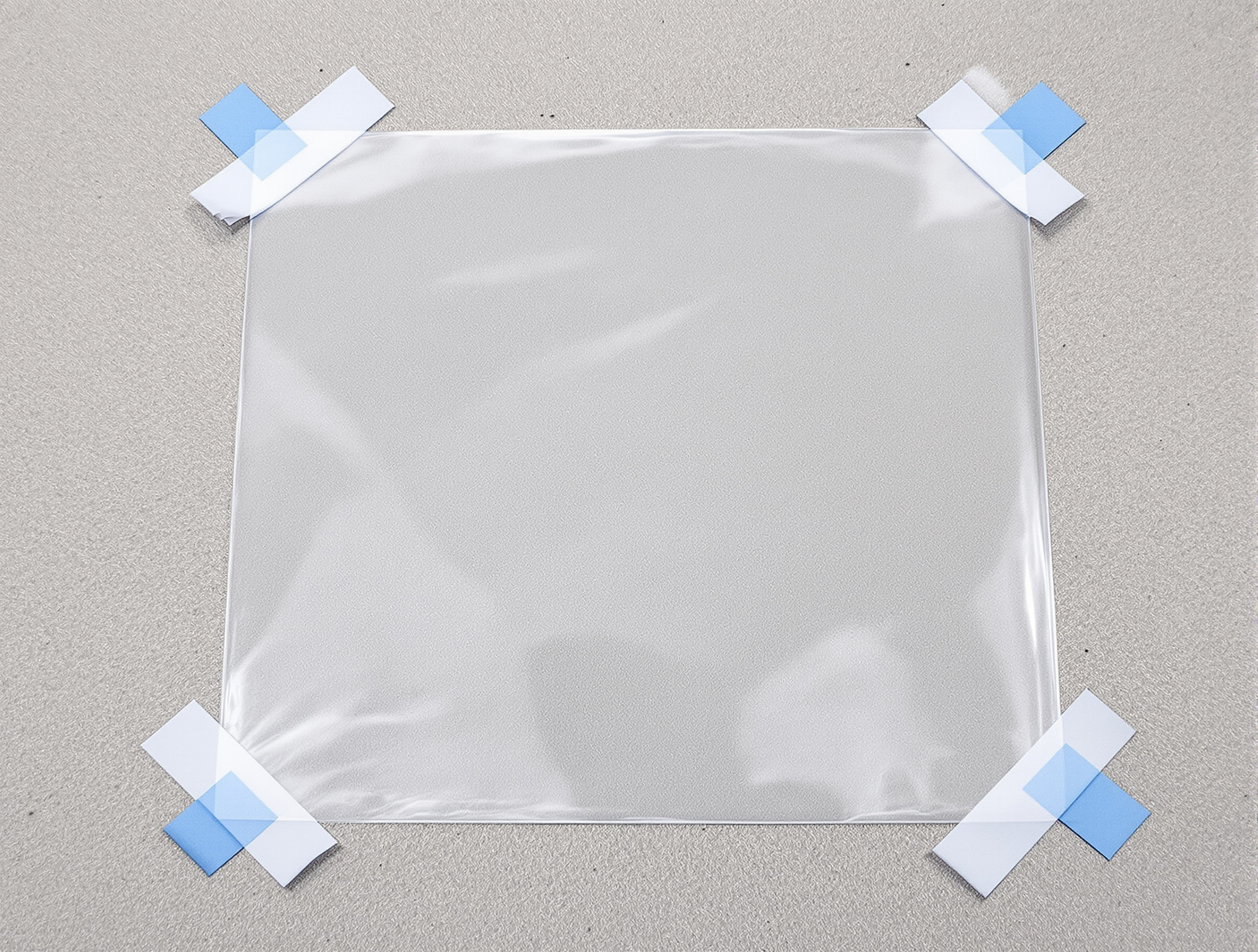 Test d'humidité sur une dalle en béton avec film plastique scotché